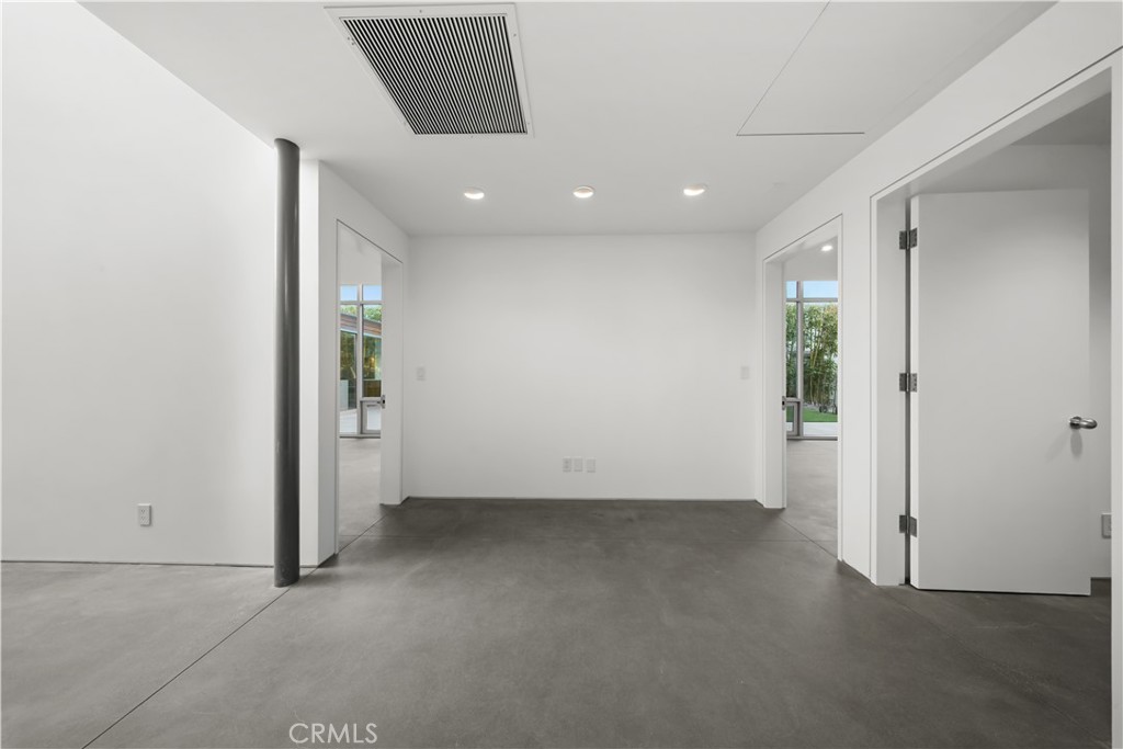 519 Santa Ana Avenue Newport Beach, CA 92663 - Photo 12 of 39 an empty room with closet and windows