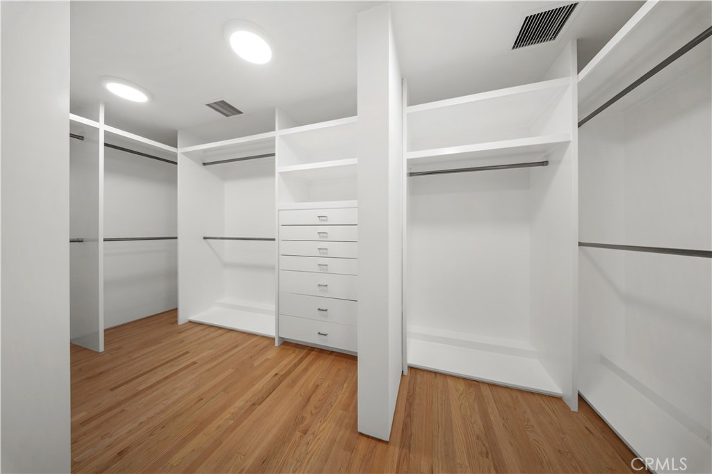 519 Santa Ana Avenue Newport Beach, CA 92663 - Photo 27 of 39 a view of walk in closet with wooden floor