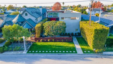 an aerial view of houses and roads