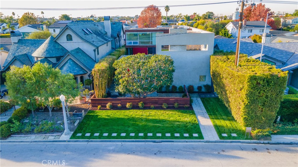 519 Santa Ana Avenue Newport Beach, CA 92663 - Photo 36 of 39 front view of a house with a yard