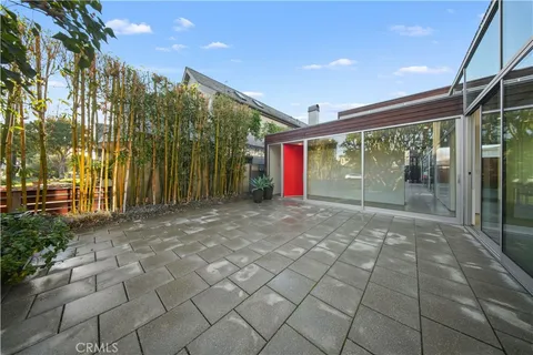 a view of a livingroom with furniture and a fireplace