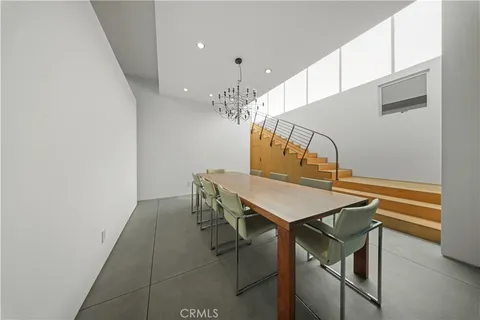 a kitchen that has a sink and a stove