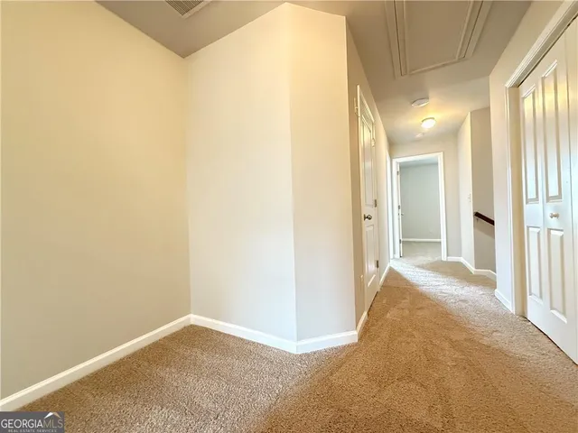 a view of a big room with wooden floor