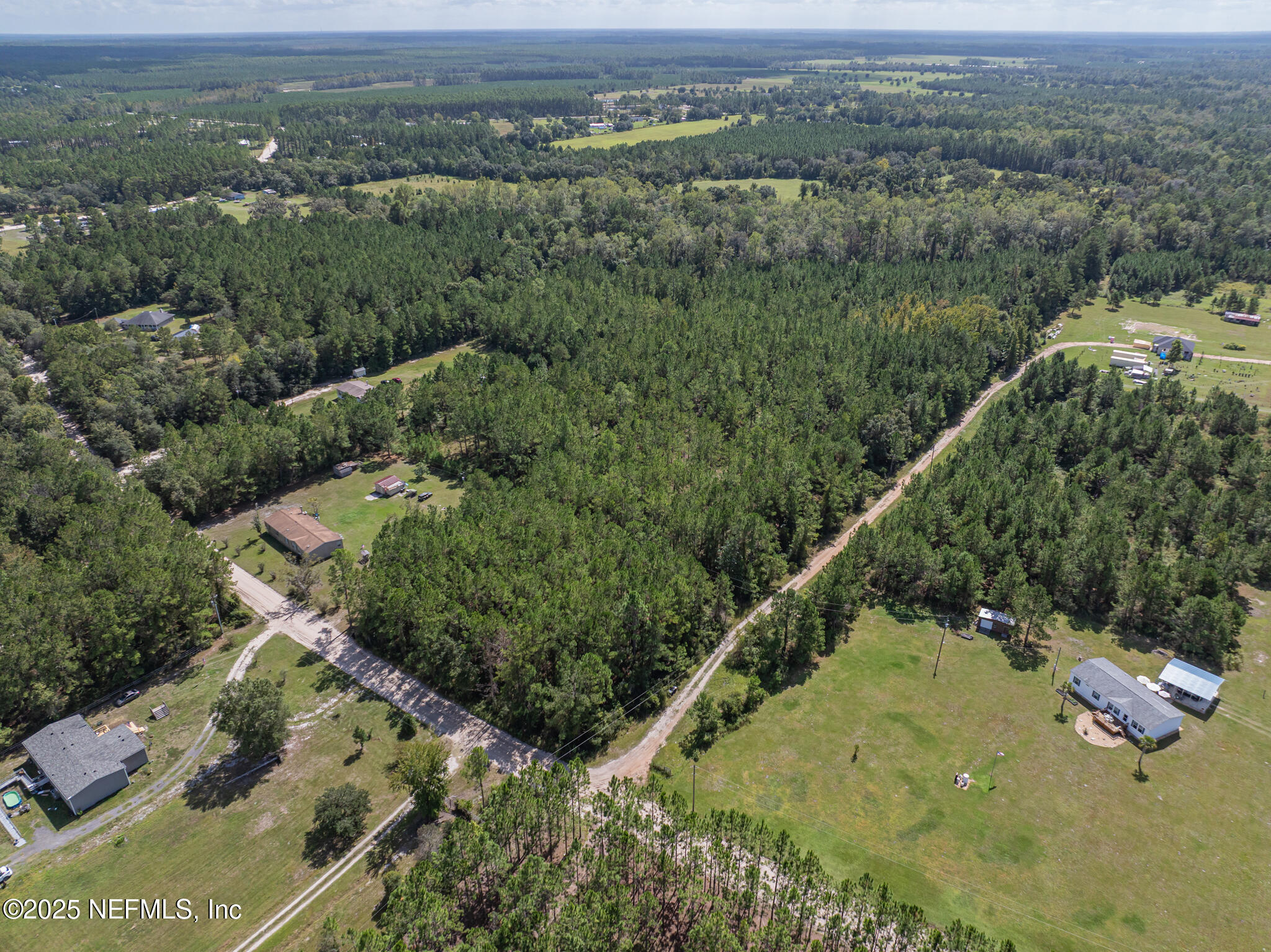 0 Broken Arrow Road Hilliard, FL 32046 - Photo 12 of 15 an aerial view of a house with a yard