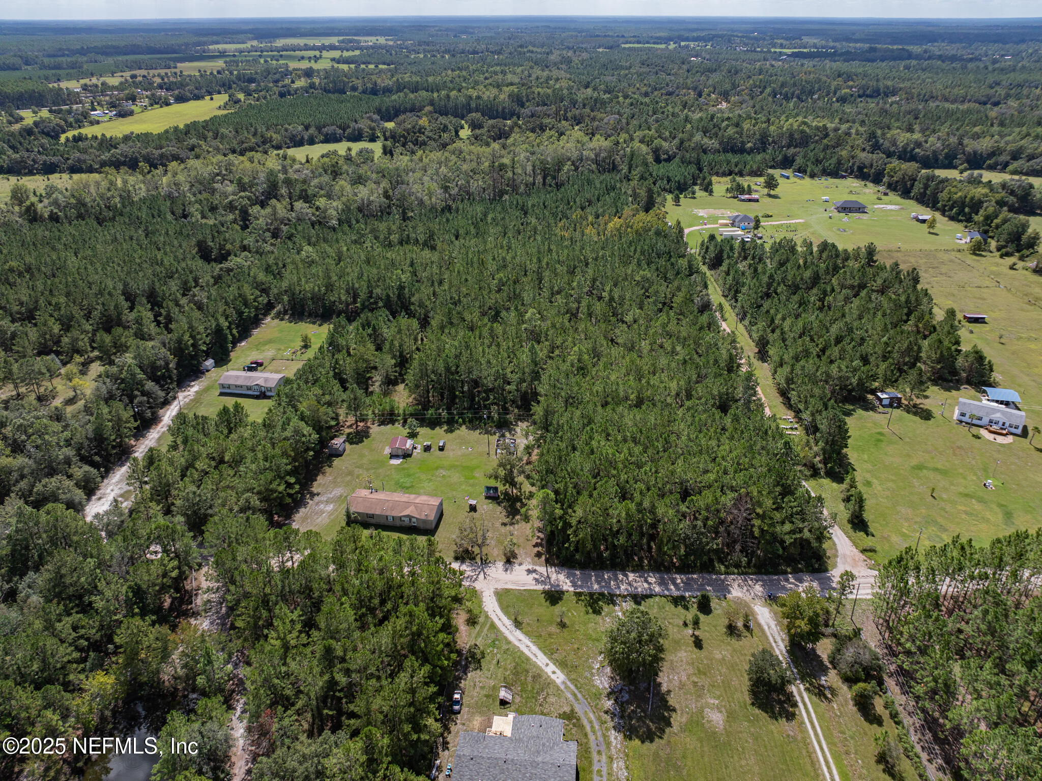 0 Broken Arrow Road Hilliard, FL 32046 - Photo 13 of 15 an aerial view of a city with lots of residential buildings