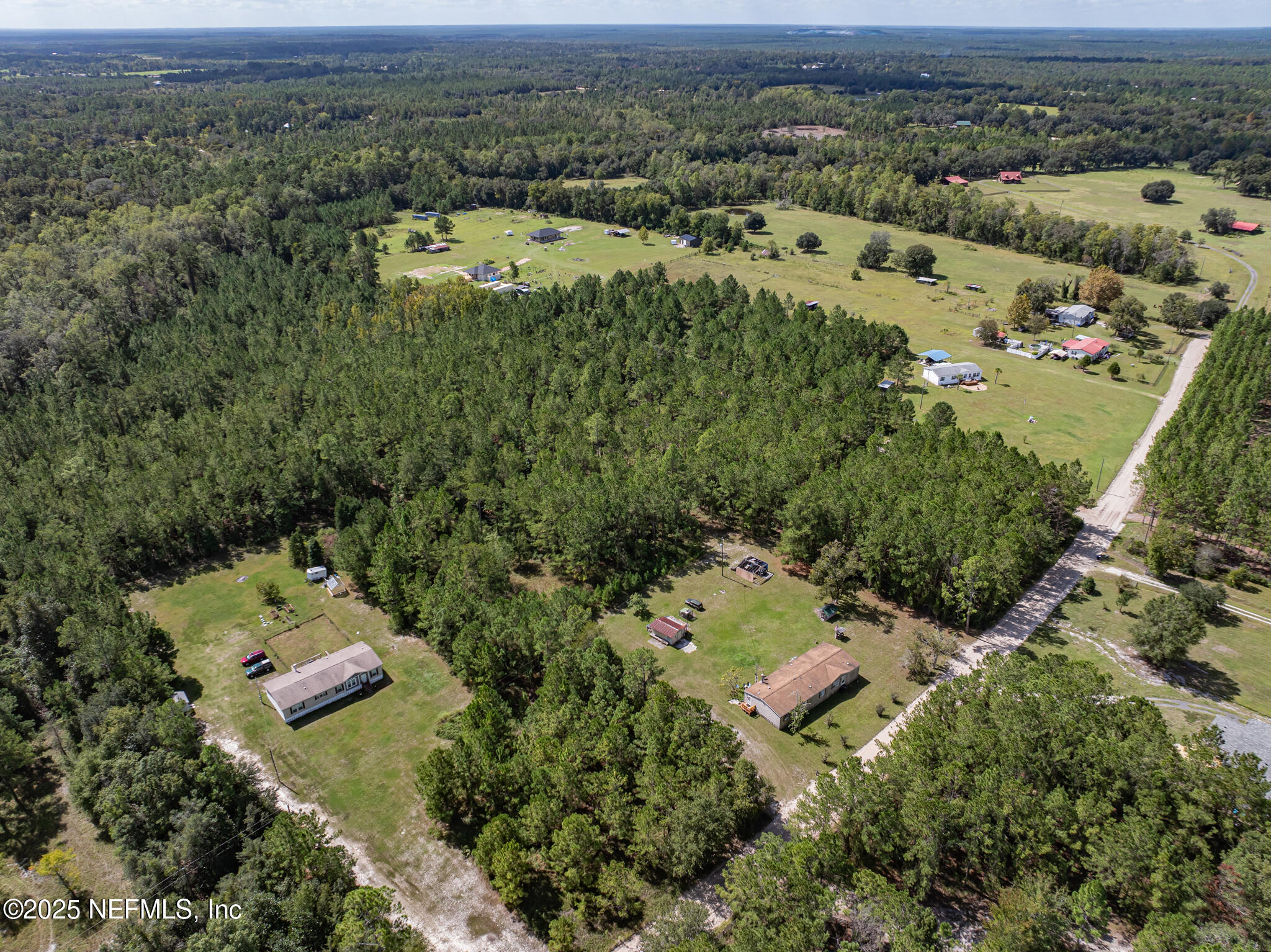 0 Broken Arrow Road Hilliard, FL 32046 - Photo 14 of 15 an aerial view of a houses with a yard