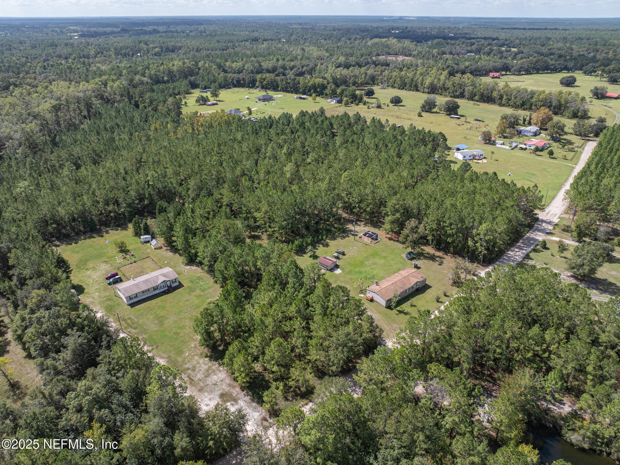 0 Broken Arrow Road Hilliard, FL 32046 - Photo 15 of 15 an aerial view of a houses with a yard