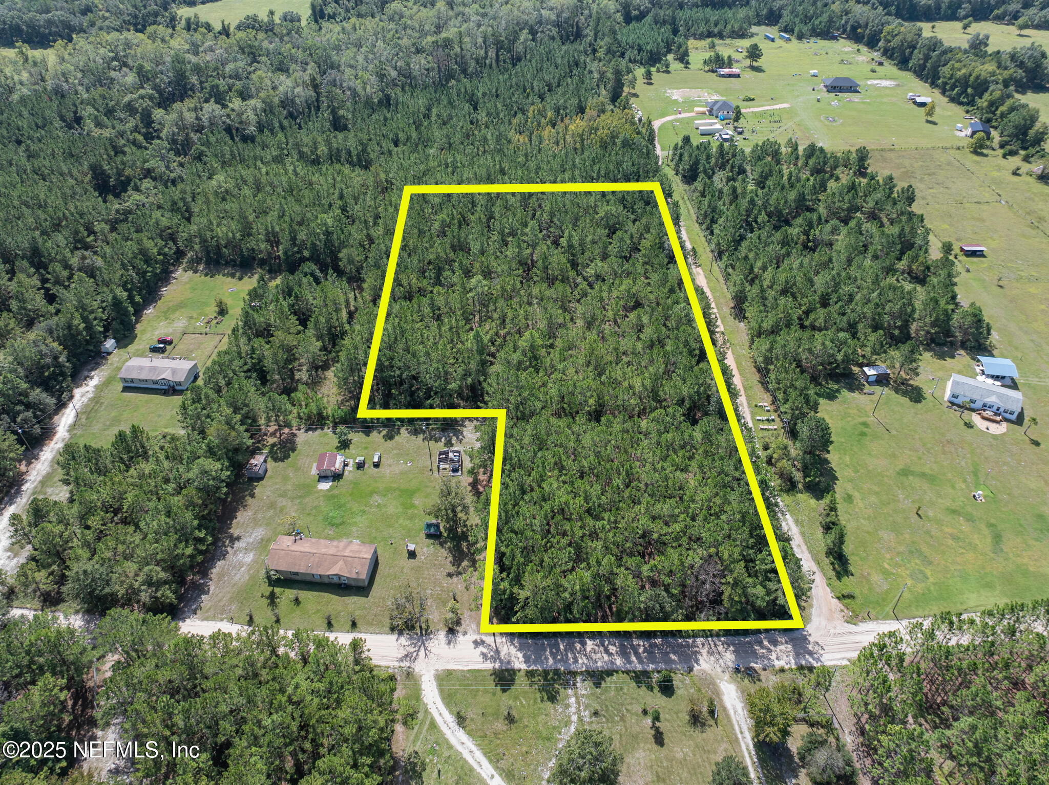 0 Broken Arrow Road Hilliard, FL 32046 - Photo 5 of 15 an aerial view of house with a yard