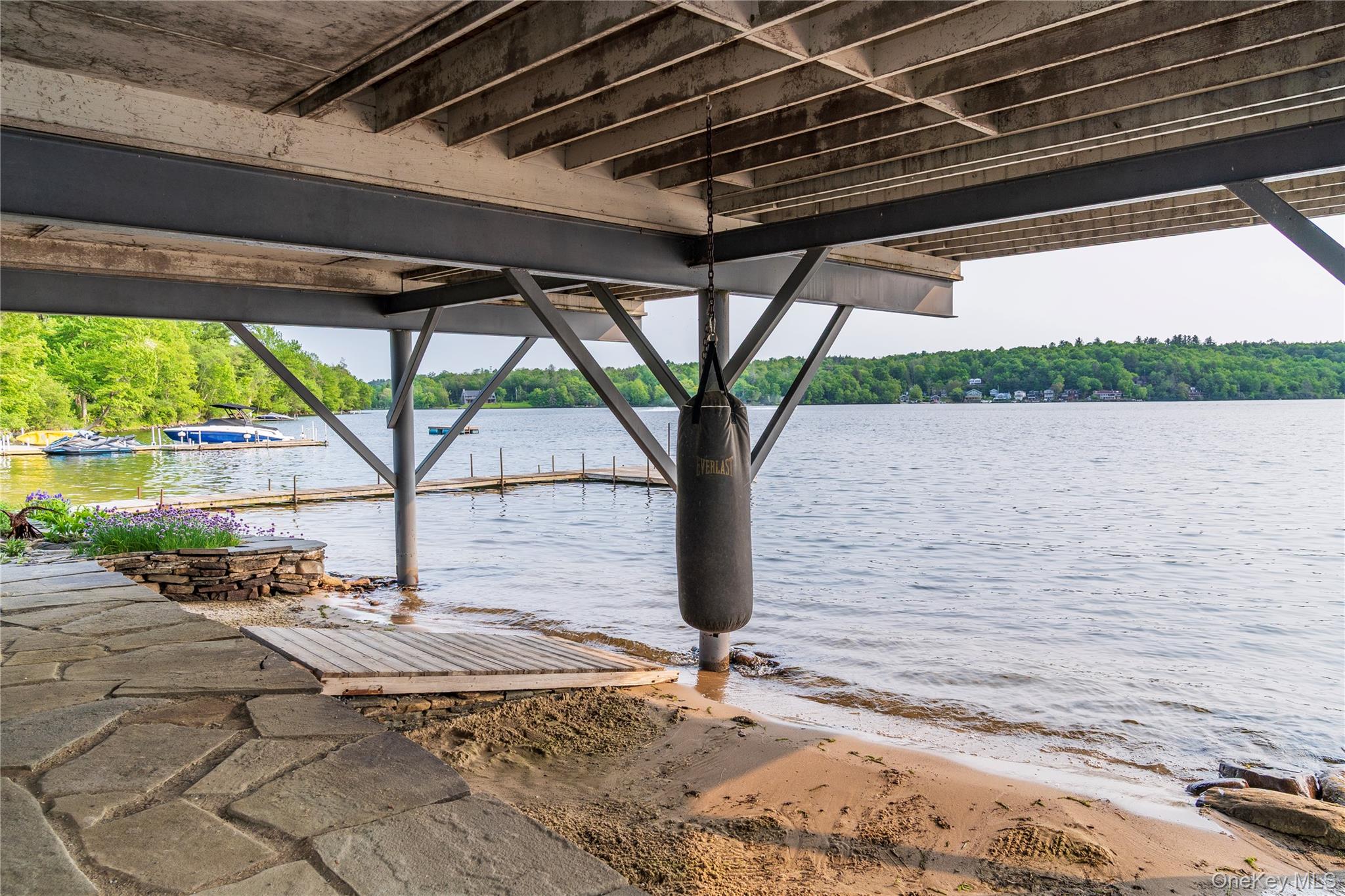 13 West Shore Road Kauneonga Lake, NY 12749 - Photo 16 of 16 a building outdoor space with a patio