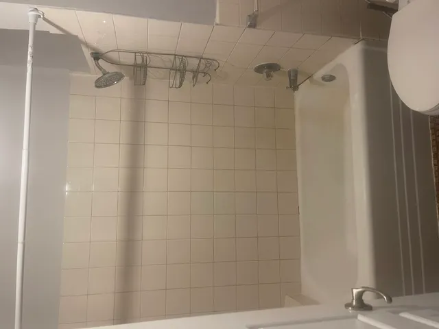 a bathroom with a sink and a window