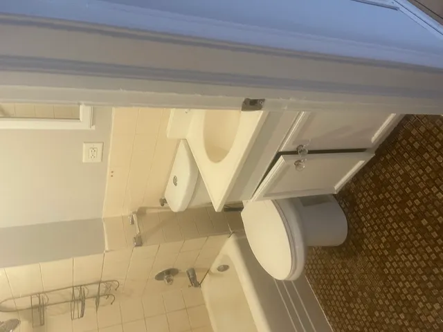 a view of empty room with windows