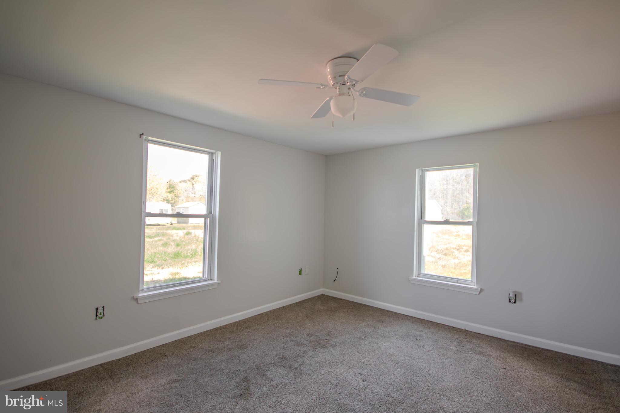 5693 Landon Store Road Marion Station, MD 21838 - Photo 10 of 20 a view of an empty room with a window