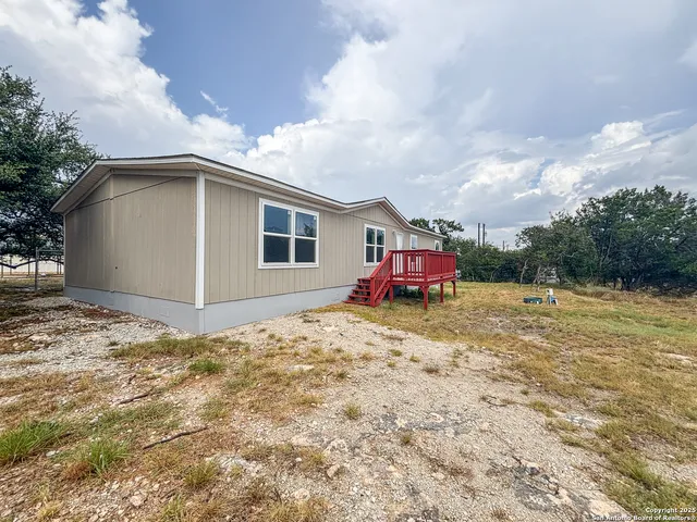 a big yard with table and chairs