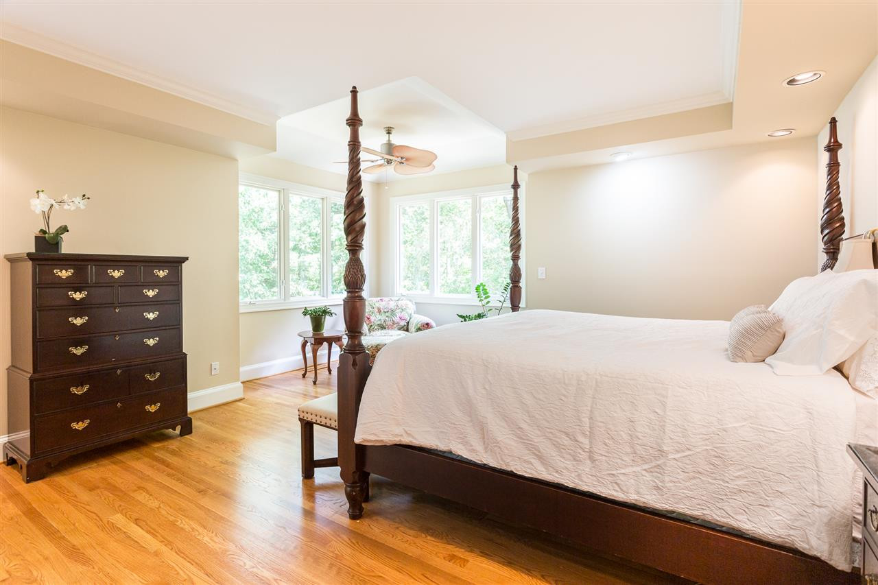 1001 Clingmans Place Raleigh, NC 27614 - Photo 14 of 30 The sitting area is nestled between two walls of windows that provide soothing natural lighting and views of the woodlands. Sitting Area in Master Suite