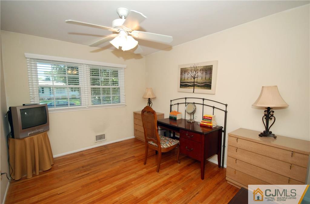 25 Glen Gary Road Middlesex, NJ 08846 - Photo 14 of 21 a view of a workspace with furniture and a window