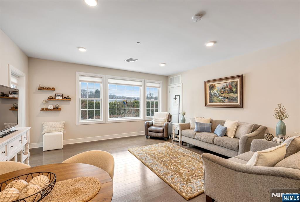 5201 Rio Vista Lane Northvale, NJ 07647 - Photo 11 of 38 a living room with furniture and a large window