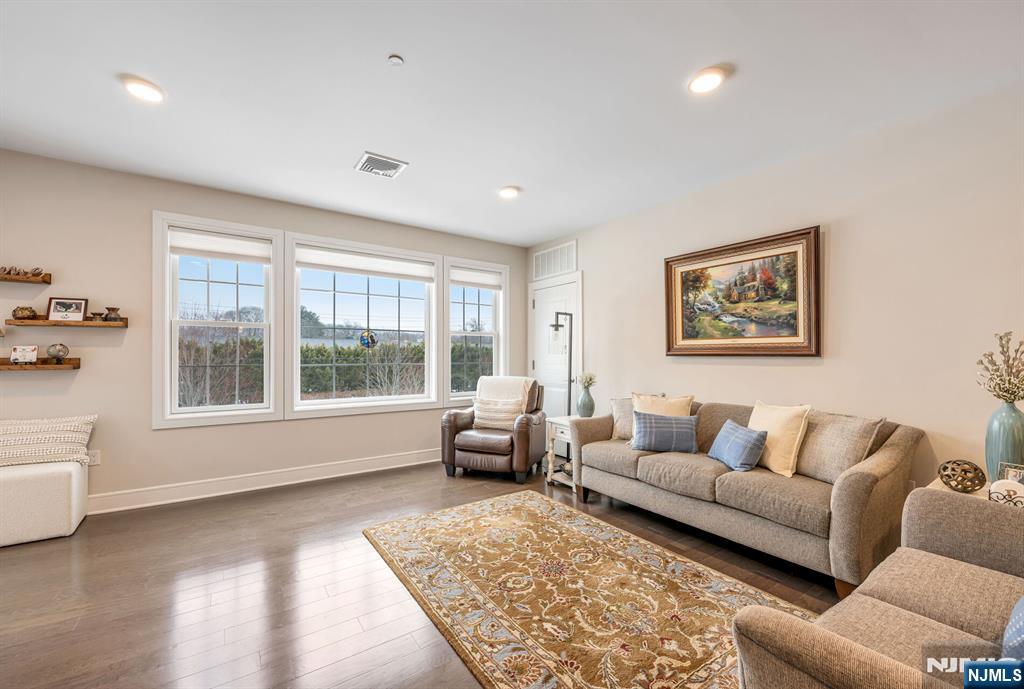5201 Rio Vista Lane Northvale, NJ 07647 - Photo 12 of 38 a living room with furniture and a large window