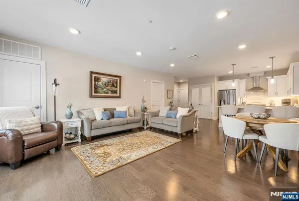 a living room with furniture and a table