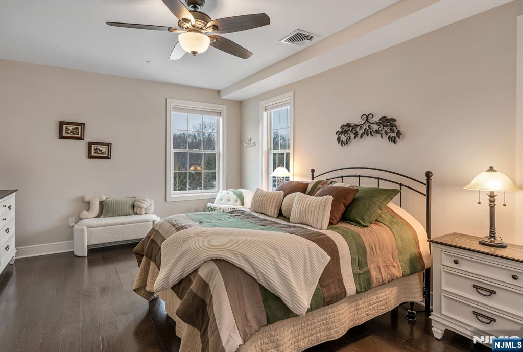 5201 Rio Vista Lane Northvale, NJ 07647 - Photo 15 of 38 a bedroom with a bed and a chandelier