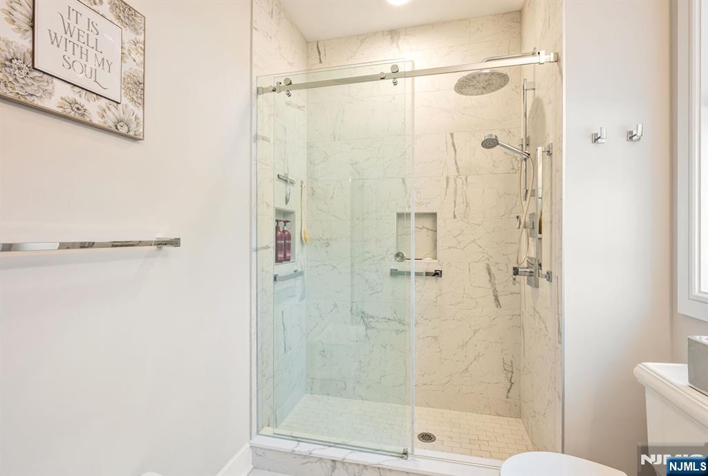 5201 Rio Vista Lane Northvale, NJ 07647 - Photo 19 of 38 a bathroom with a shower and a toilet