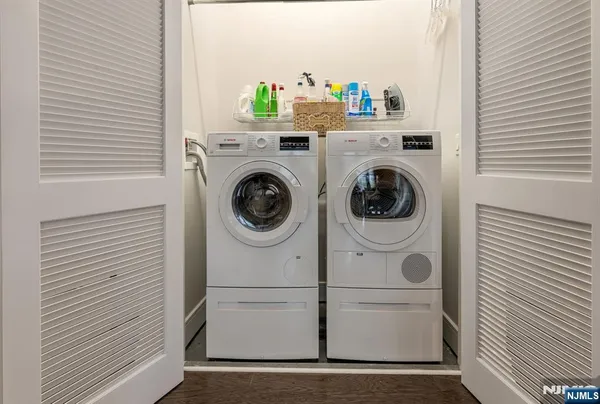 a utility room with dryer and washer