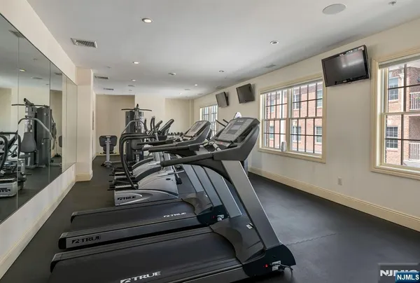 a view of a room with gym equipment