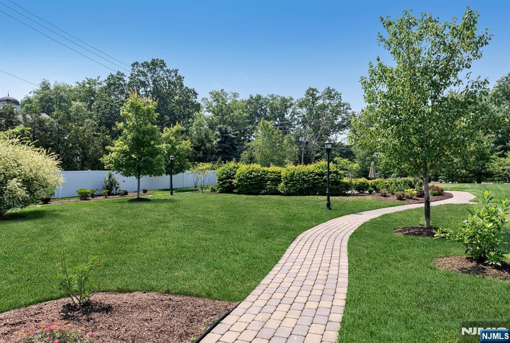 5201 Rio Vista Lane Northvale, NJ 07647 - Photo 33 of 38 a view of a garden with a slide