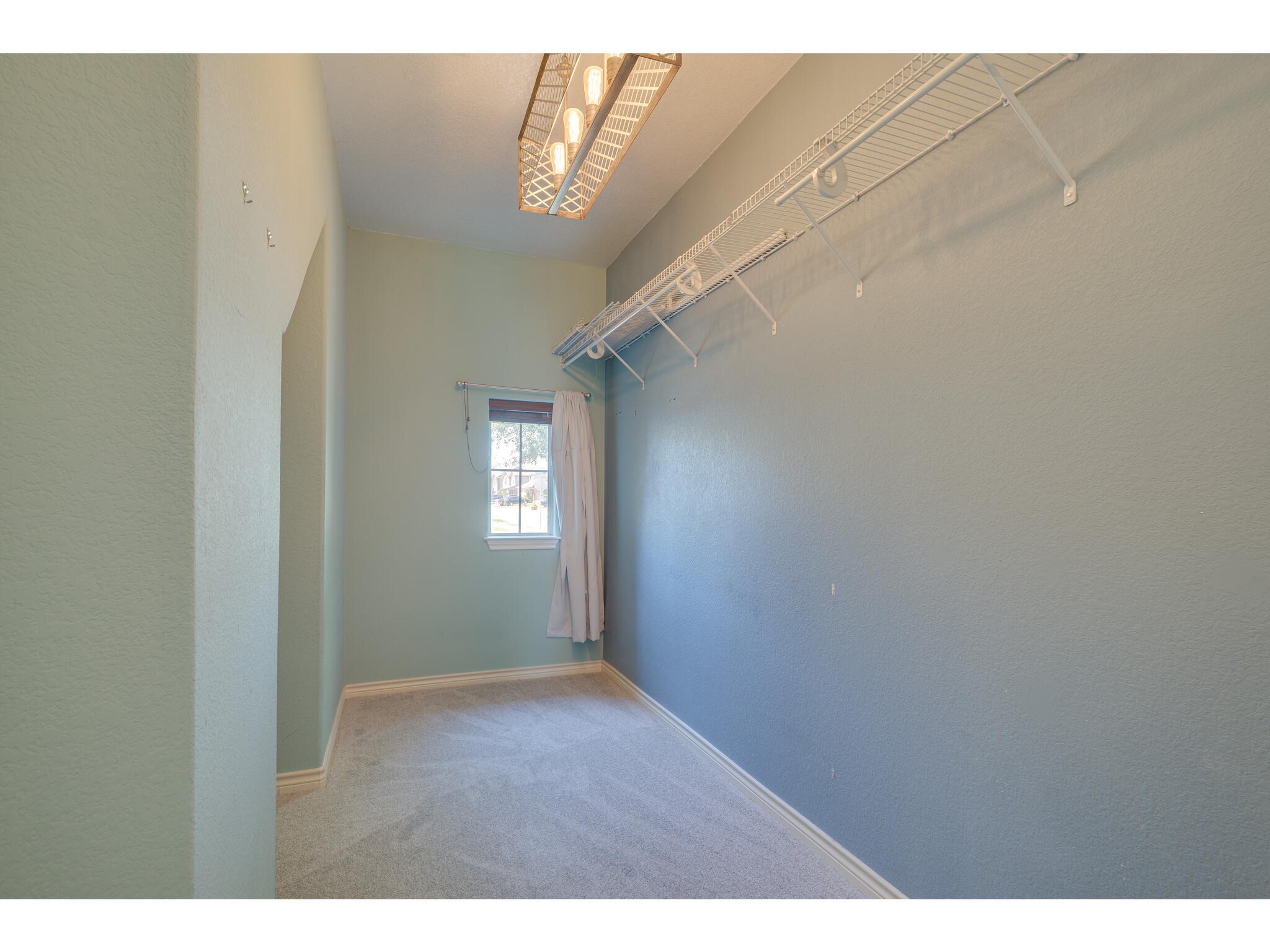 13925 Fallsprings Way Manor, TX 78653 - Photo 26 of 39 a view of an empty room with a window