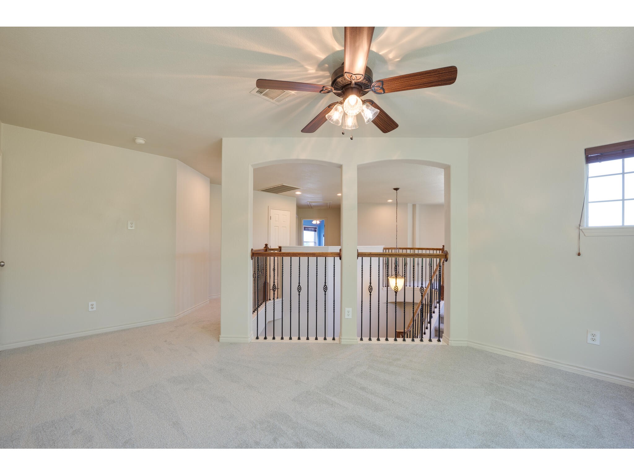 13925 Fallsprings Way Manor, TX 78653 - Photo 30 of 39 a view of an empty room with a window