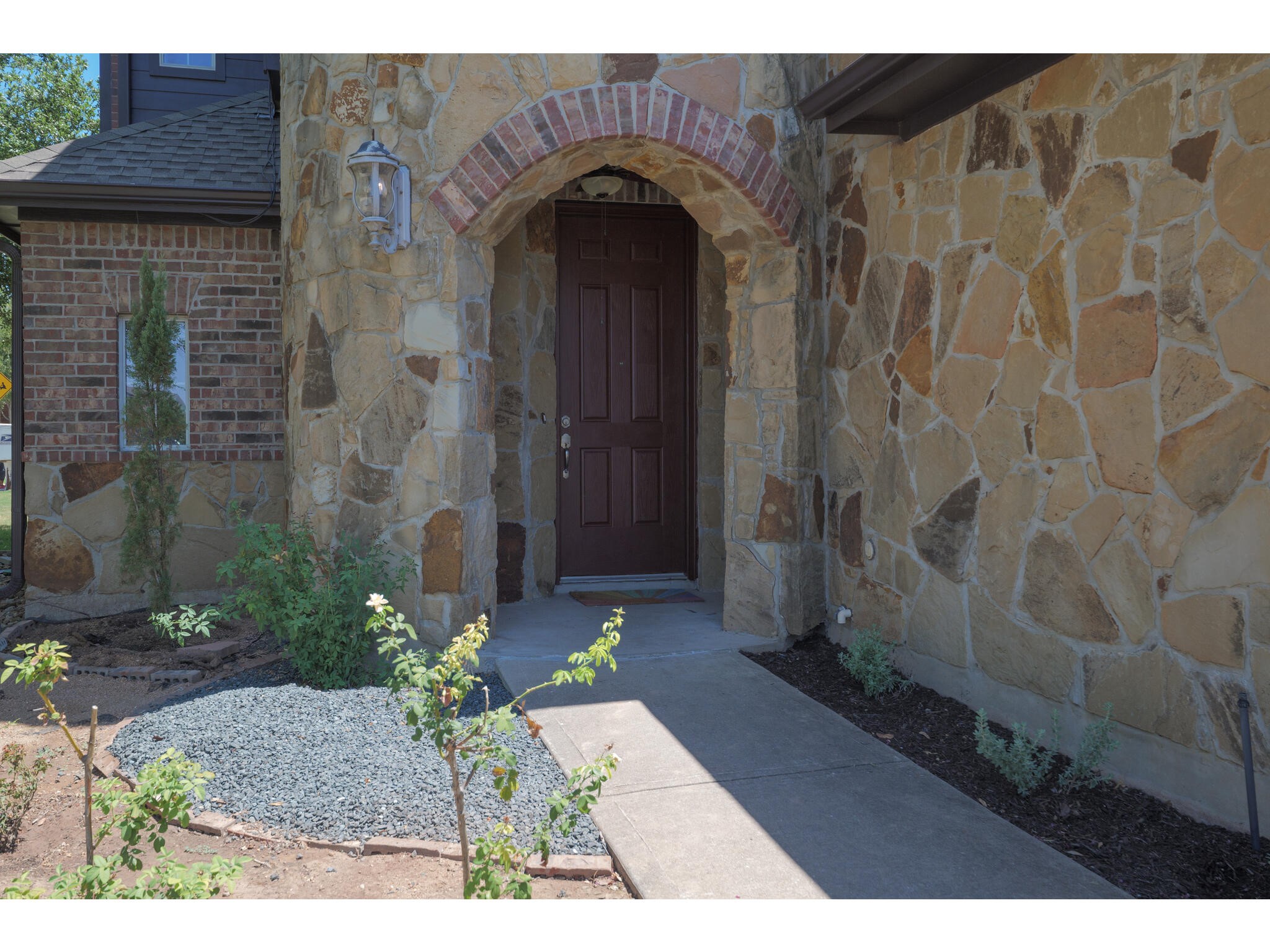 13925 Fallsprings Way Manor, TX 78653 - Photo 7 of 39 a view of a entryway door front of house