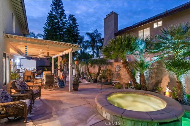 a view of a swimming pool with a patio