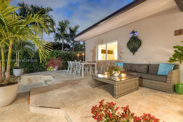 a view of a patio with swimming pool