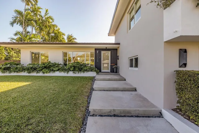 a view of a house with swimming pool