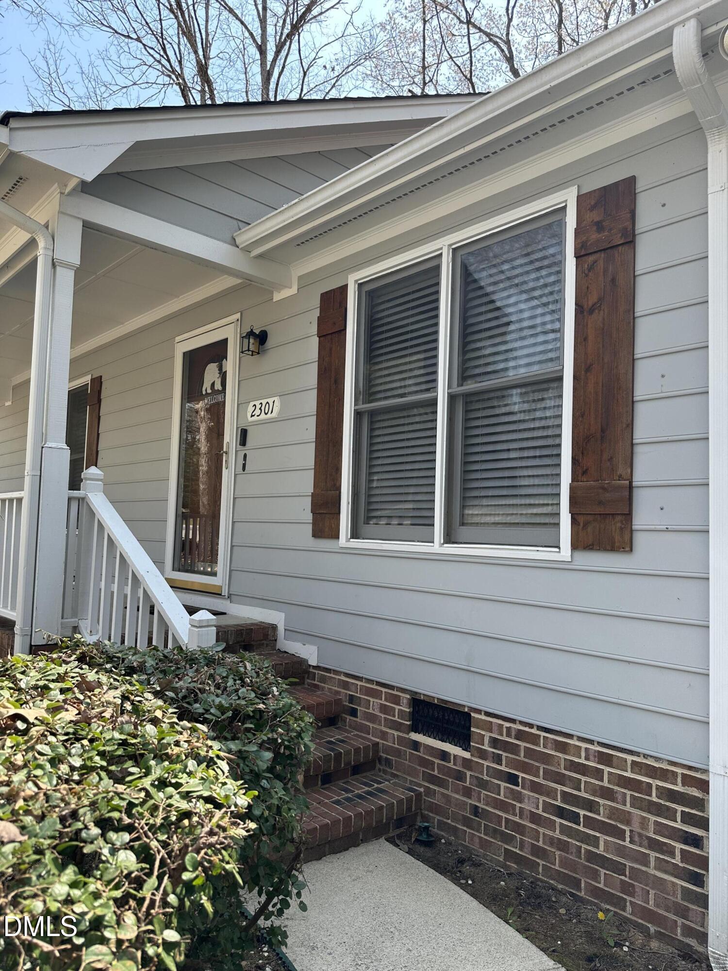 2301 Ruddy Road Raleigh, NC 27616 - Photo 2 of 17 a front view of a house with a yard