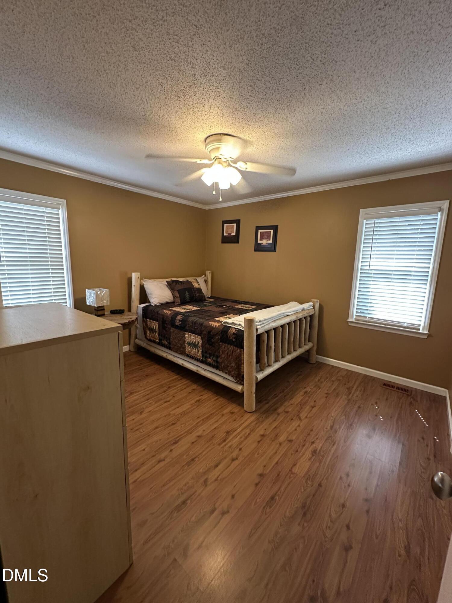 2301 Ruddy Road Raleigh, NC 27616 - Photo 8 of 17 a room with furniture and a window