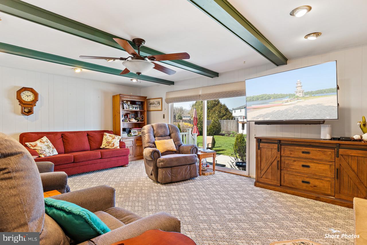 22 Stonebridge Road Cherry Hill, NJ 08003 - Photo 19 of 43 family room with sliding glass doors to patio
