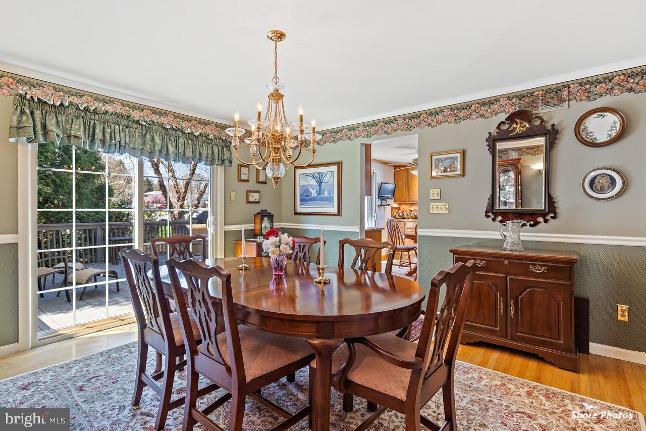 22 Stonebridge Road Cherry Hill, NJ 08003 - Photo 10 of 43 dining room with patio doors to deck