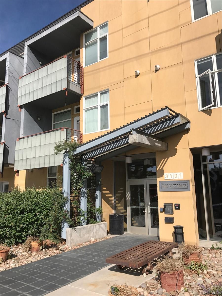 a front view of a house with a outdoor space