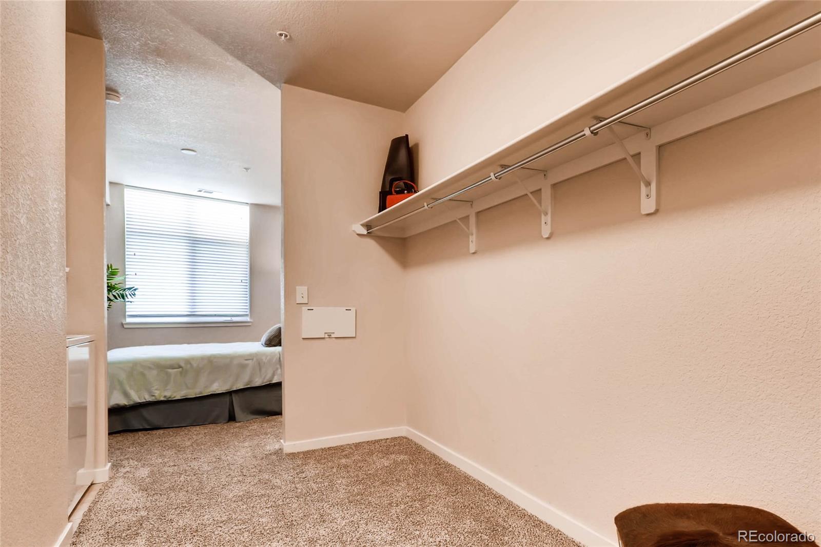 3101 Blake Street, Unit 214 Denver, CO 80205 - Photo 12 of 17 a view of bedroom and bedroom