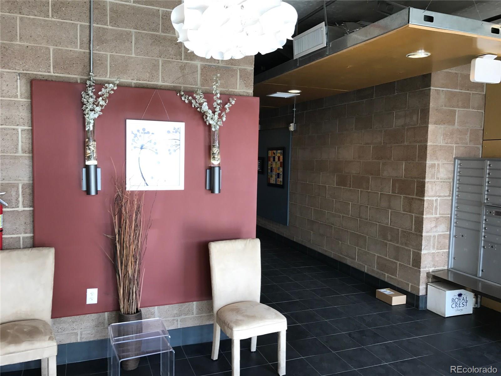 3101 Blake Street, Unit 214 Denver, CO 80205 - Photo 14 of 17 a bathroom with a toilet and a sink
