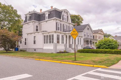 a view of a house with a swimming pool