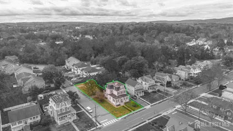 an aerial view of residential house with outdoor space