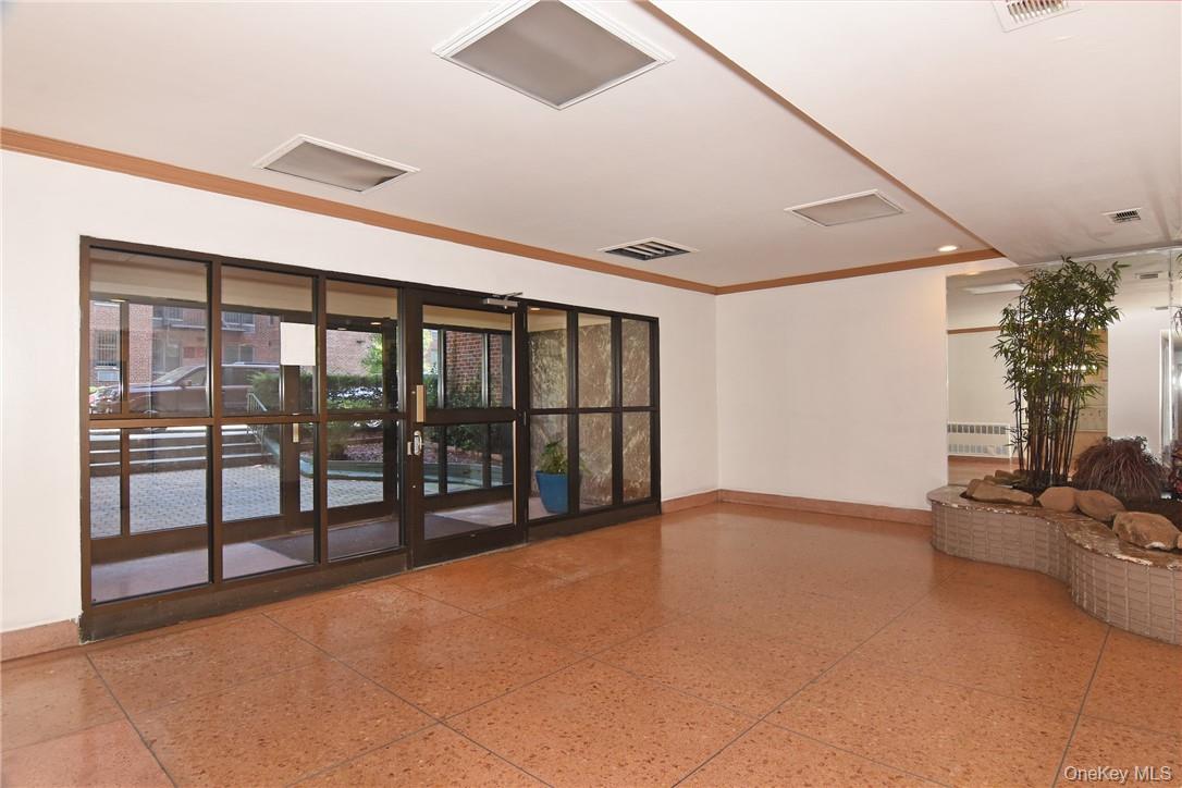 2165 Matthews Avenue, Unit 4A Bronx, NY 10462 - Photo 16 of 23 a view of an empty room with windows