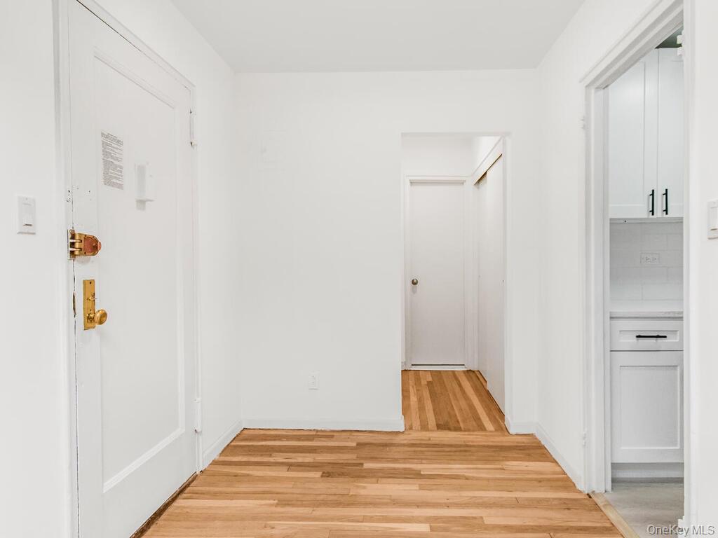 2165 Matthews Avenue, Unit 4A Bronx, NY 10462 - Photo 4 of 23 a bedroom with a bed and a table