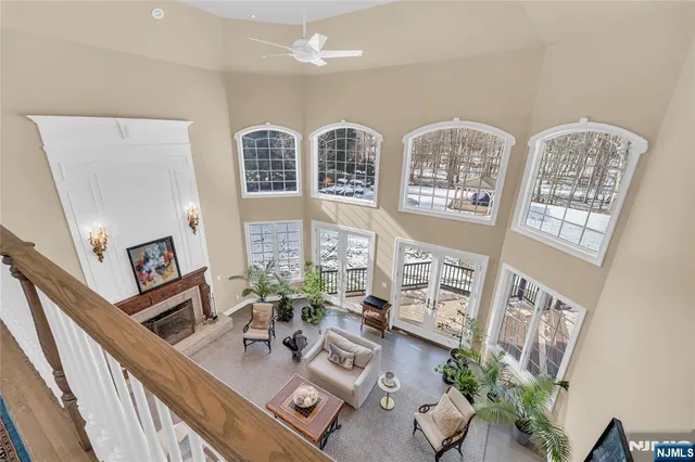 a bedroom with a bed and a chair