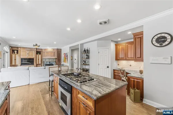 a kitchen with a stove and a refrigerator