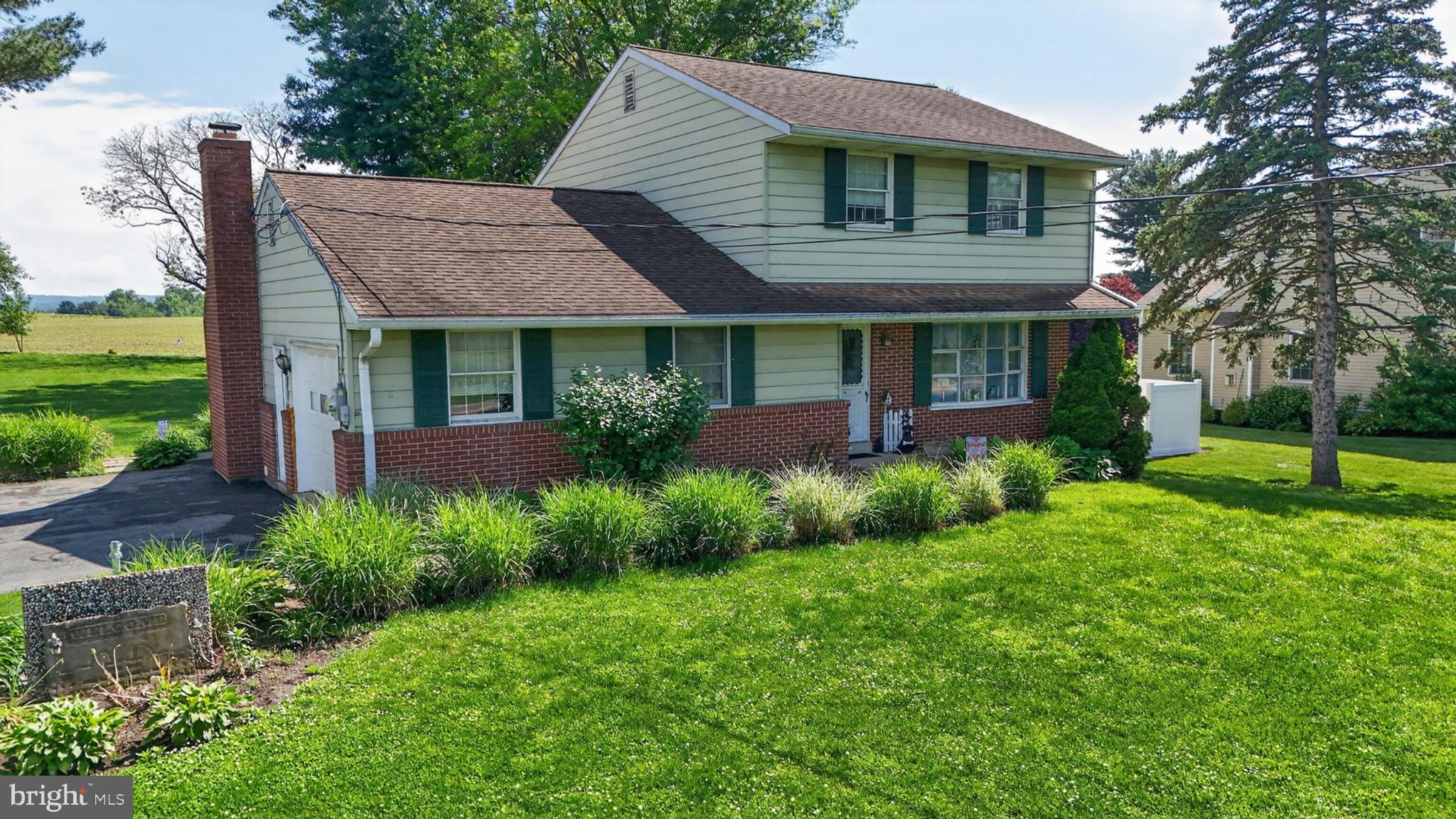 1106 Village Road Lancaster, PA 17602 - Photo 11 of 42 Charming home with lush greenery.