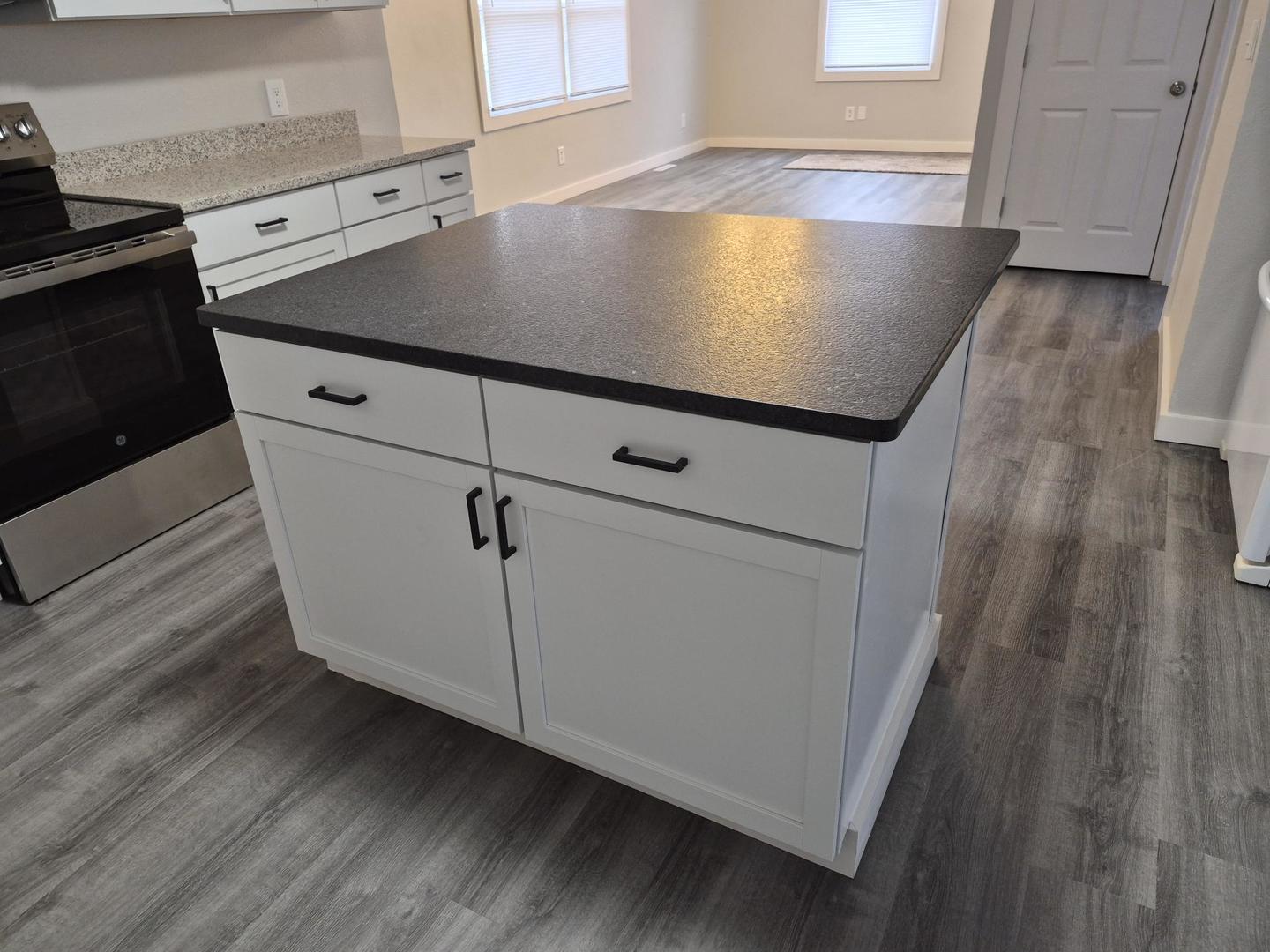 101 North 6th Avenue New Windsor, IL 61465 - Photo 12 of 33 a view of cabinets and wooden floor