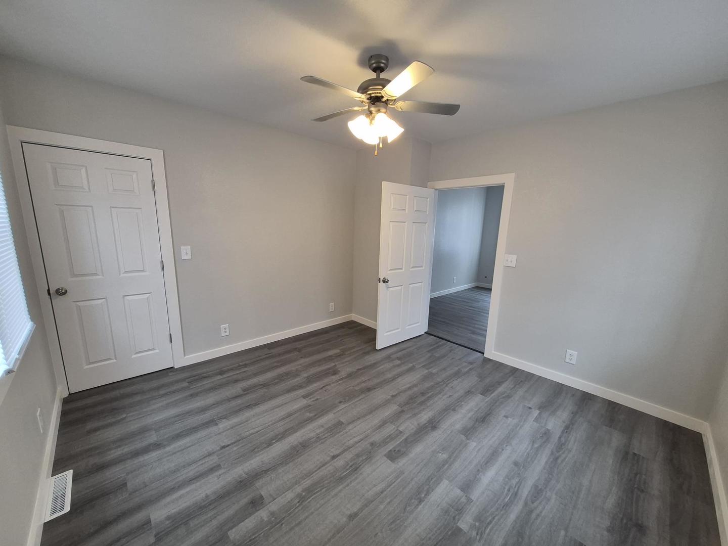 101 North 6th Avenue New Windsor, IL 61465 - Photo 25 of 33 a view of an empty room with wooden floor