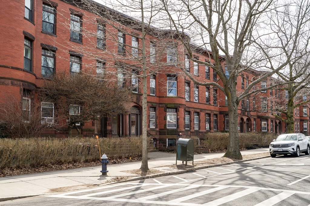 1891 Beacon Street, Unit 2 Brookline, MA 02445 - Photo 2 of 31 a view of a building and a street